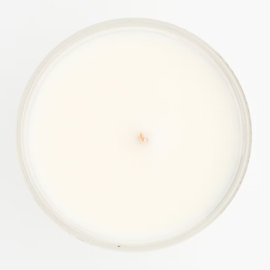 Une bougie Jolis Baume vue du dessus.