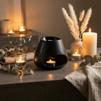Brûle parfum Bulb noir Scentchips avec cire parfumée sur surface minimaliste