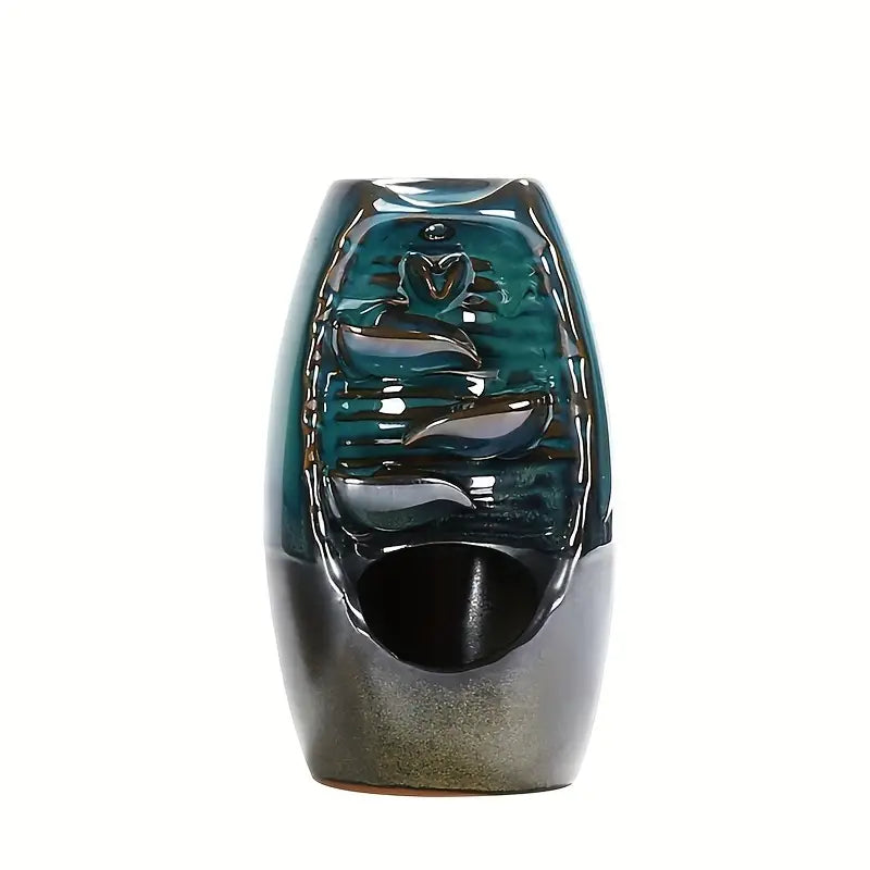 Photo d'un brûleur d'encens à refoulement en céramique modèle Cascade apaisante bleue détouré sur fond blanc