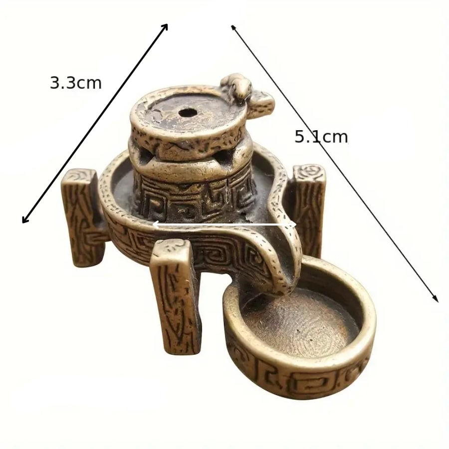 Un brûleur d'encens en cascade en bronze avec ses dimensions indiquées.