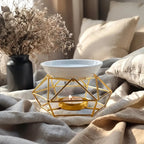 Diffuseur aromatique doré en céramique avec bol blanc et support bougie, décoration élégante minimaliste