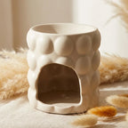 Diffuseur céramique Bubbles beige pour cires parfumées sur lin avec décoration minimaliste