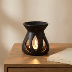 Diffuseur céramique noir ajouré avec flamme, décoration luxe pour cires et huiles