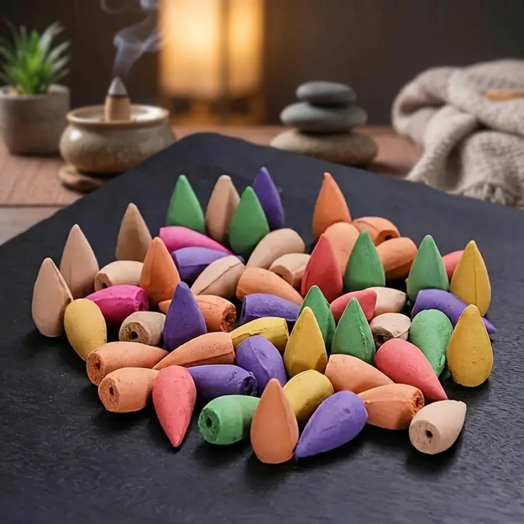 Encens cônes Osmanthus couleurs pastel effet fumée relaxant sur surface ardoise