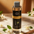 Huile diffuseur Arabian Nights 400ml Scentchips sur marbre avec fleurs de jasmin et bougies