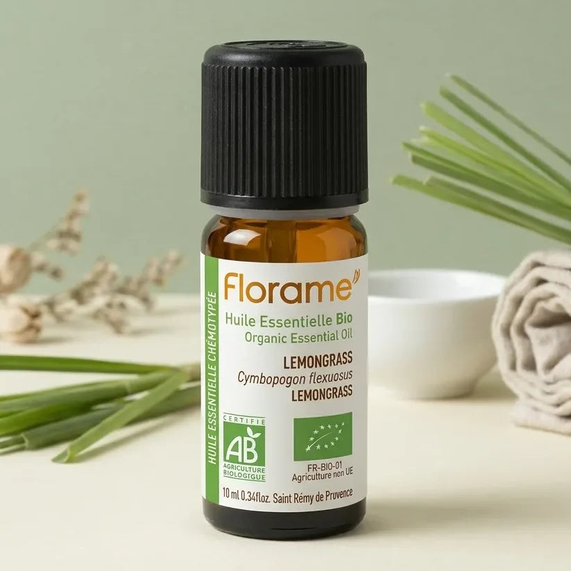 Flacon d'huile essentielle bio Lemongrass Florame 10ml avec brins de citronelle frais