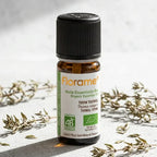Huile essentielle bio thym fort Florame 5ml avec certification AB sur surface pierre Provence