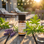 Flacon 10ml Huiles essentielles Été Tranquille Bio Florame entouré de lavande et bougies