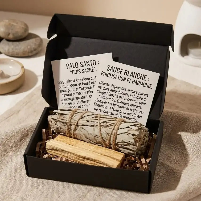 Kit de purification sauge et palo santo dans boîte noire élégante sur linge naturel